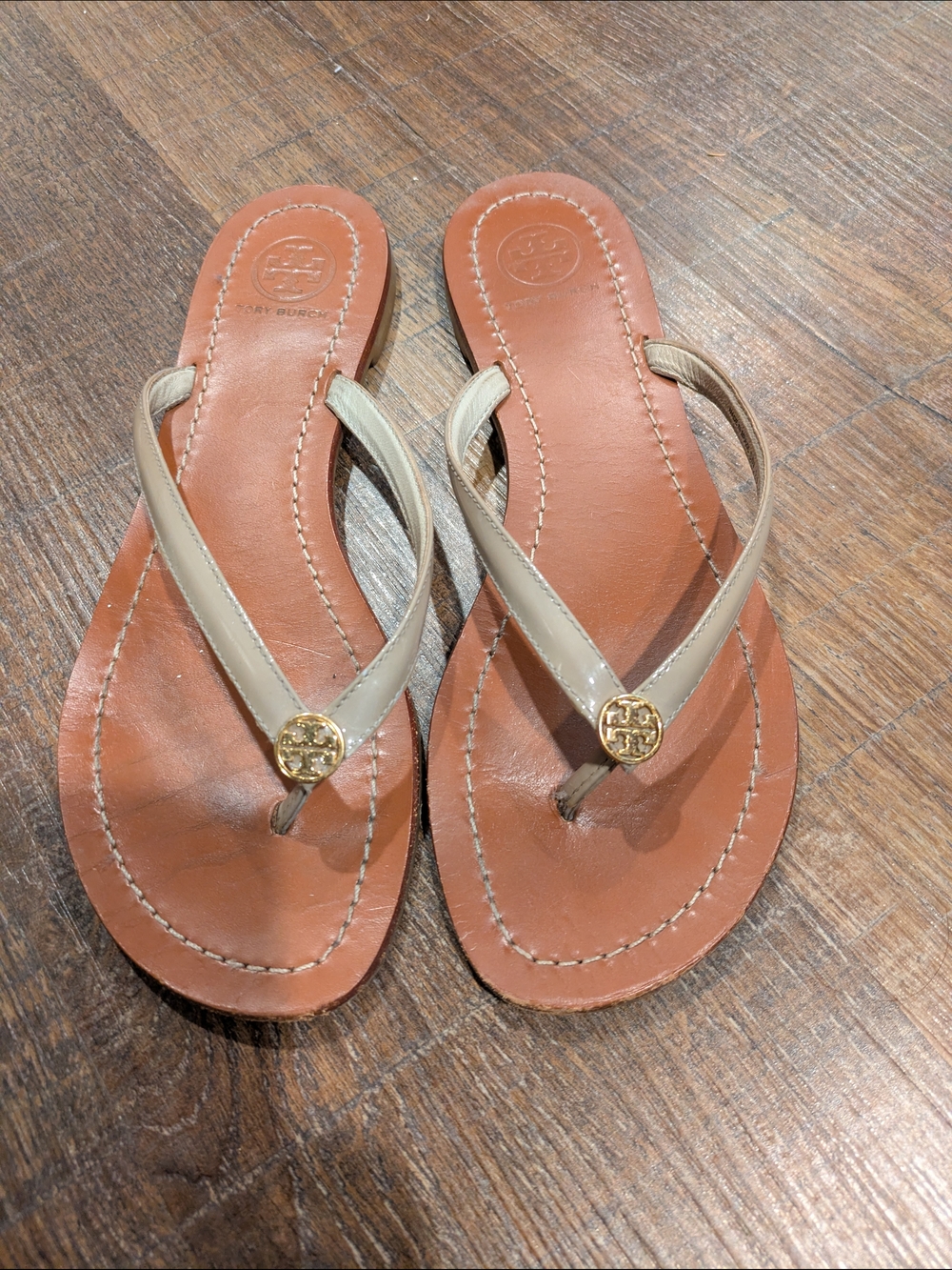 Tory Burch Brown Leather Flip Flop Sandals with Beige Straps and Gold Logo